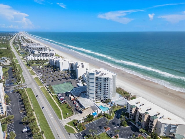 bird's eye view with a view of the beach and a water view