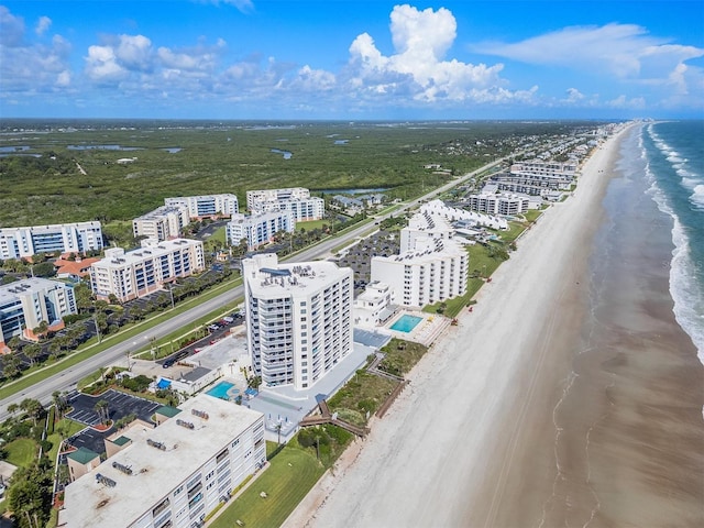 drone / aerial view with a view of the beach and a water view