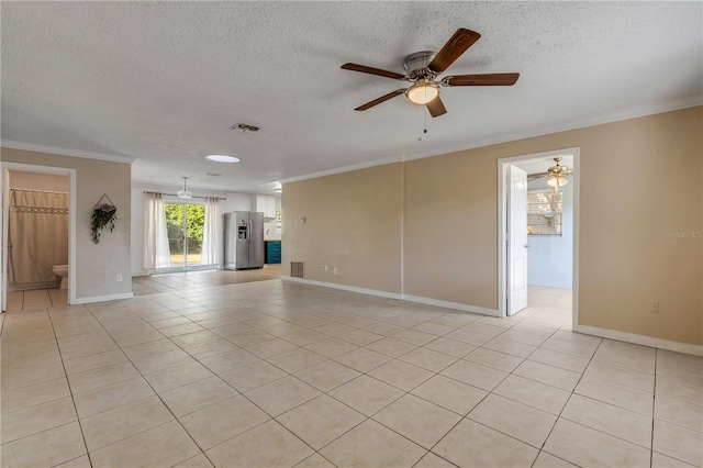 unfurnished living room featuring ornamental molding, a textured ceiling, and light tile patterned floors