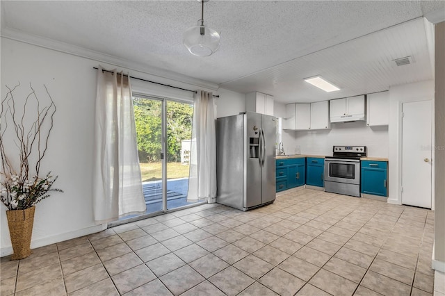 kitchen with blue cabinetry, appliances with stainless steel finishes, white cabinetry, ornamental molding, and a textured ceiling