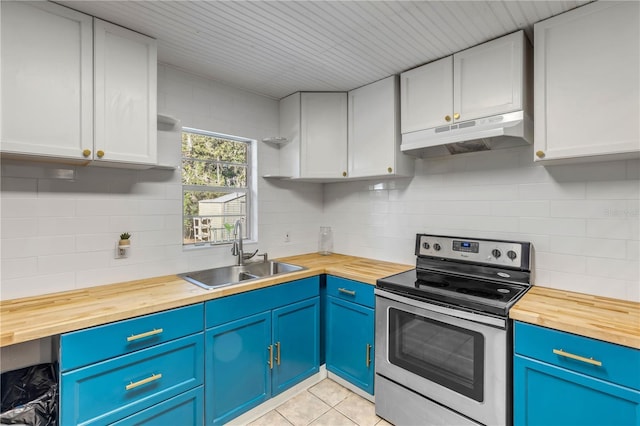 kitchen featuring butcher block counters, sink, white cabinetry, and stainless steel range with electric stovetop