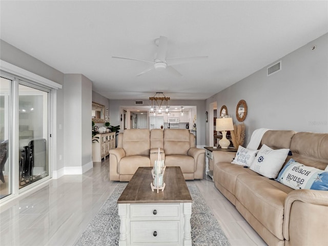 living room with ceiling fan