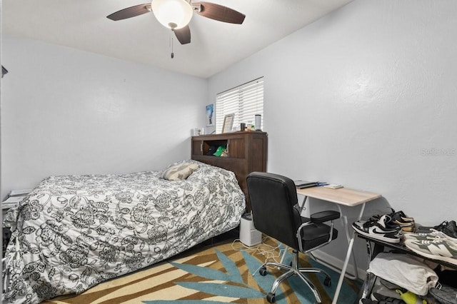 bedroom featuring ceiling fan