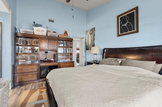 bedroom with light hardwood / wood-style floors