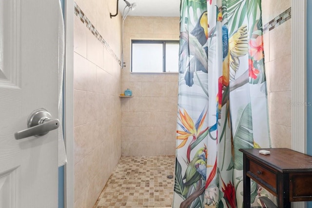 bathroom featuring a shower with curtain