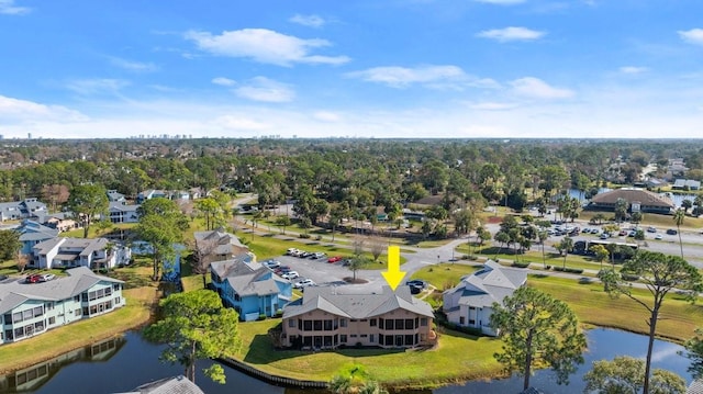 drone / aerial view featuring a water view