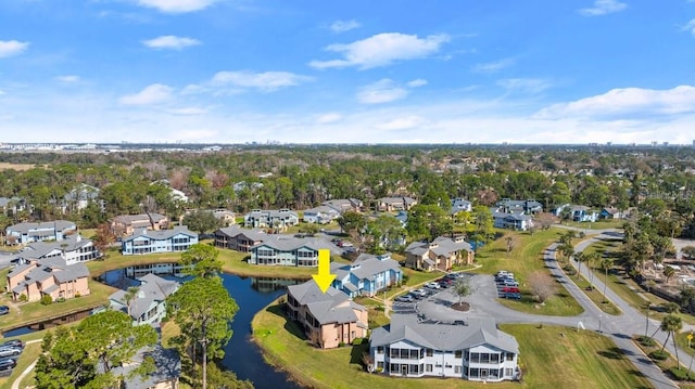 bird's eye view with a water view