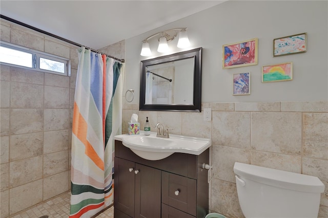 bathroom featuring tile walls, curtained shower, and toilet