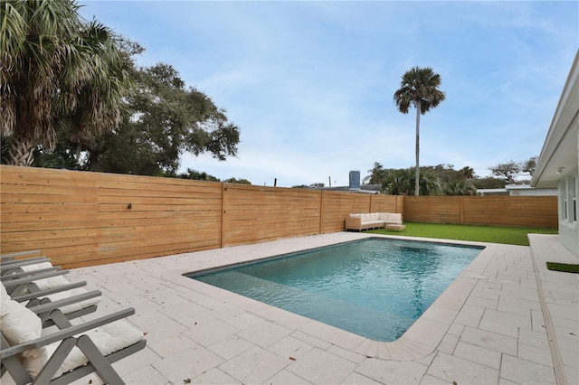 view of pool featuring a patio area