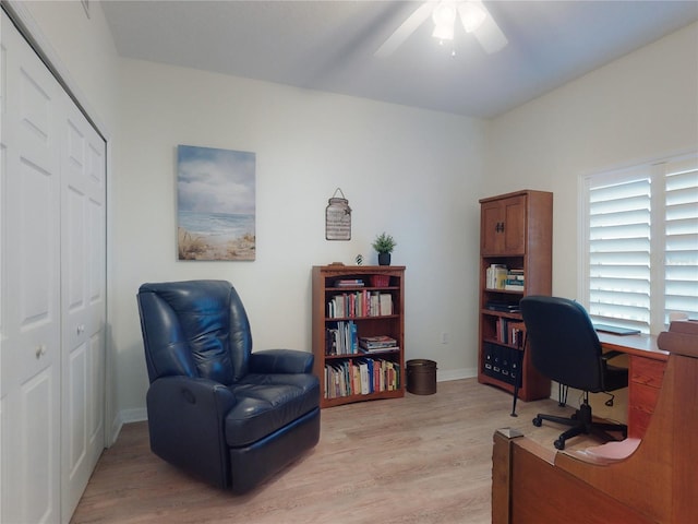 office area with ceiling fan and light wood-type flooring