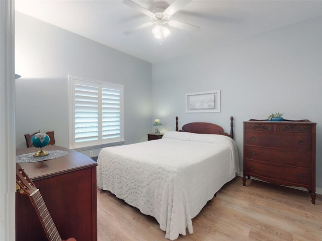 5300 S Atlantic Ave Unit 3-504, New Smyrna Beach, FL 32169 - bedroom with a ceiling fan and light wood-style flooring
