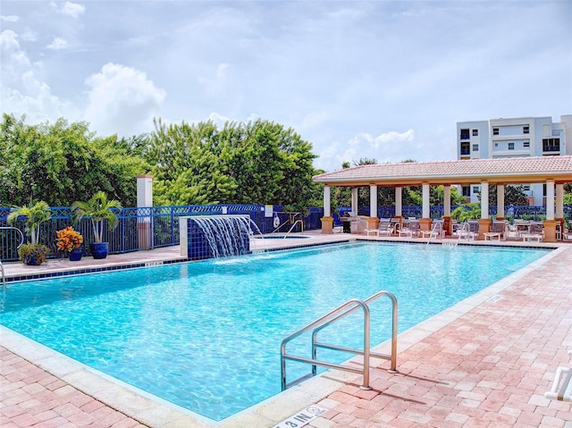 5300 S Atlantic Ave Unit 3-504, New Smyrna Beach, FL 32169 - pool with fence and a patio area