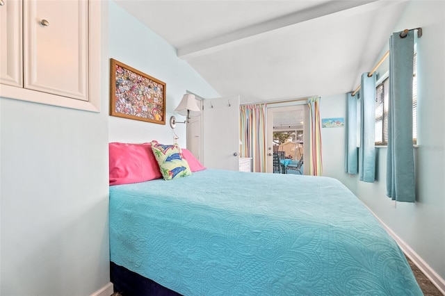 bedroom with lofted ceiling with beams and access to outside