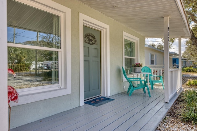 wooden deck with covered porch