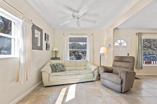 living room featuring ceiling fan