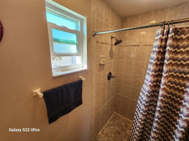 bathroom with walk in shower