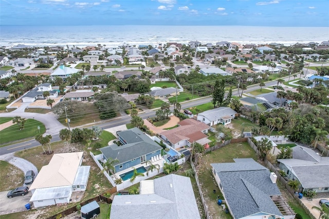 birds eye view of property featuring a residential view and a water view