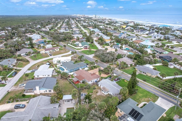 bird's eye view featuring a water view and a residential view