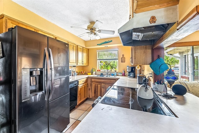 kitchen featuring light tile patterned floors, light countertops, ventilation hood, dishwasher, and stainless steel fridge with ice dispenser