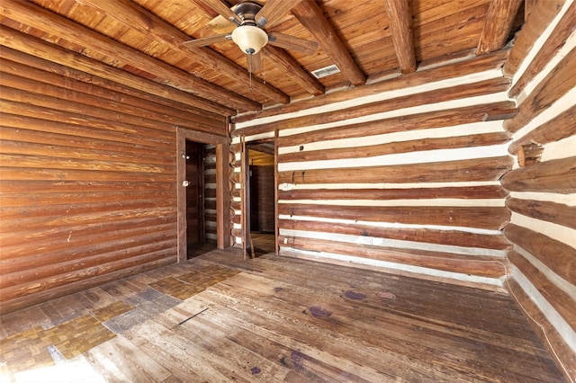 interior space with ceiling fan