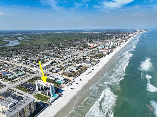 bird's eye view with a view of the beach and a water view