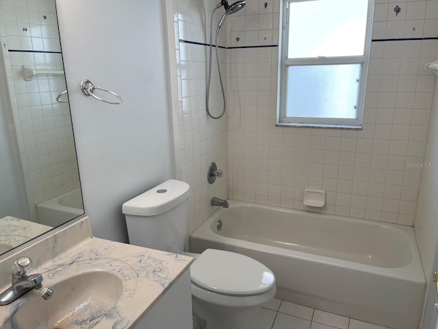 full bath featuring shower / washtub combination, vanity, tile patterned flooring, and toilet