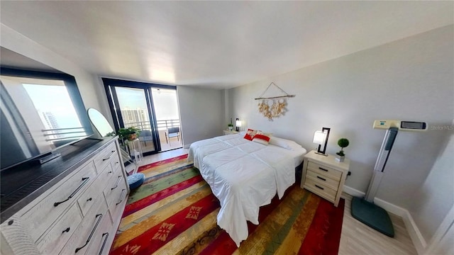 bedroom featuring dark wood-type flooring