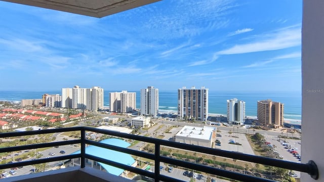 balcony featuring a water view