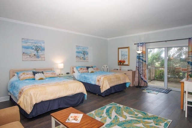 bedroom with crown molding, dark hardwood / wood-style floors, and access to outside