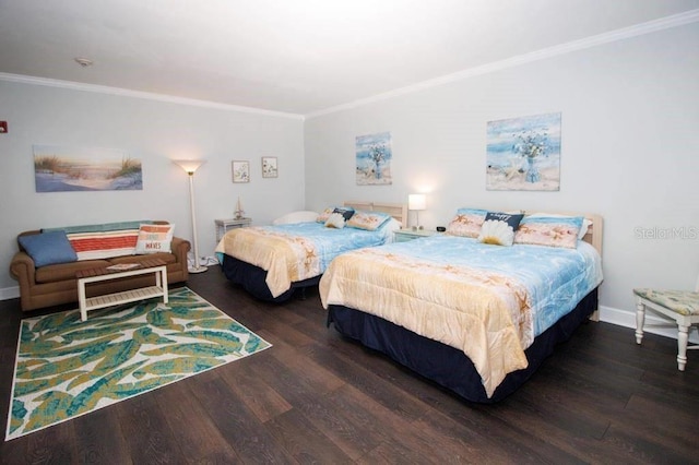 bedroom with crown molding and dark wood-type flooring