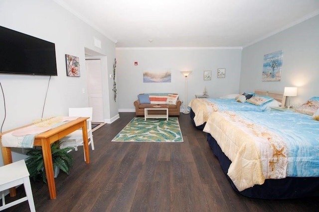 bedroom featuring crown molding and dark hardwood / wood-style floors