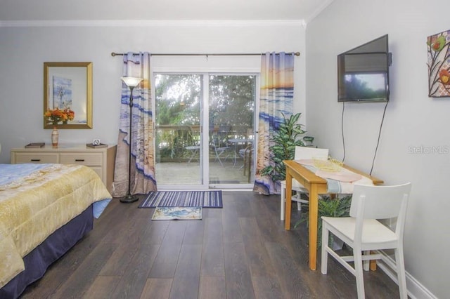 bedroom with ornamental molding and dark hardwood / wood-style floors