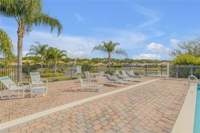 view of patio featuring a water view