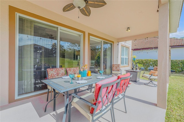 view of patio featuring ceiling fan