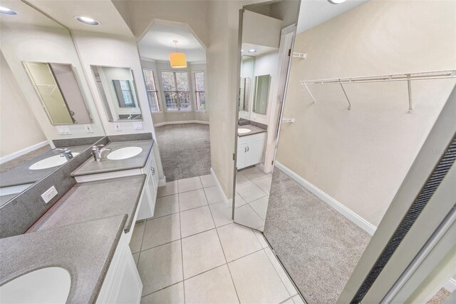 bathroom featuring vanity and tile patterned flooring