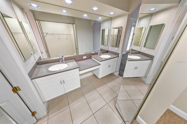 bathroom with vanity and tile patterned floors