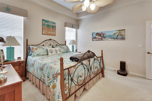 bedroom with light carpet and ceiling fan