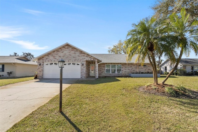 single story home featuring a garage, driveway, a front lawn, and brick siding