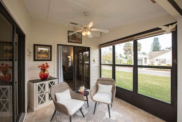 sunroom / solarium with ceiling fan and a wealth of natural light