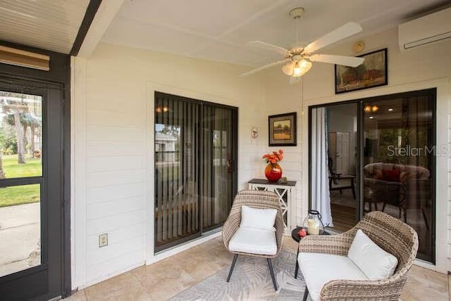 sunroom / solarium with ceiling fan and a wall mounted AC