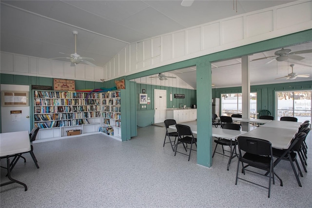 dining room with high vaulted ceiling and ceiling fan