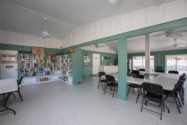 dining area featuring high vaulted ceiling and ceiling fan