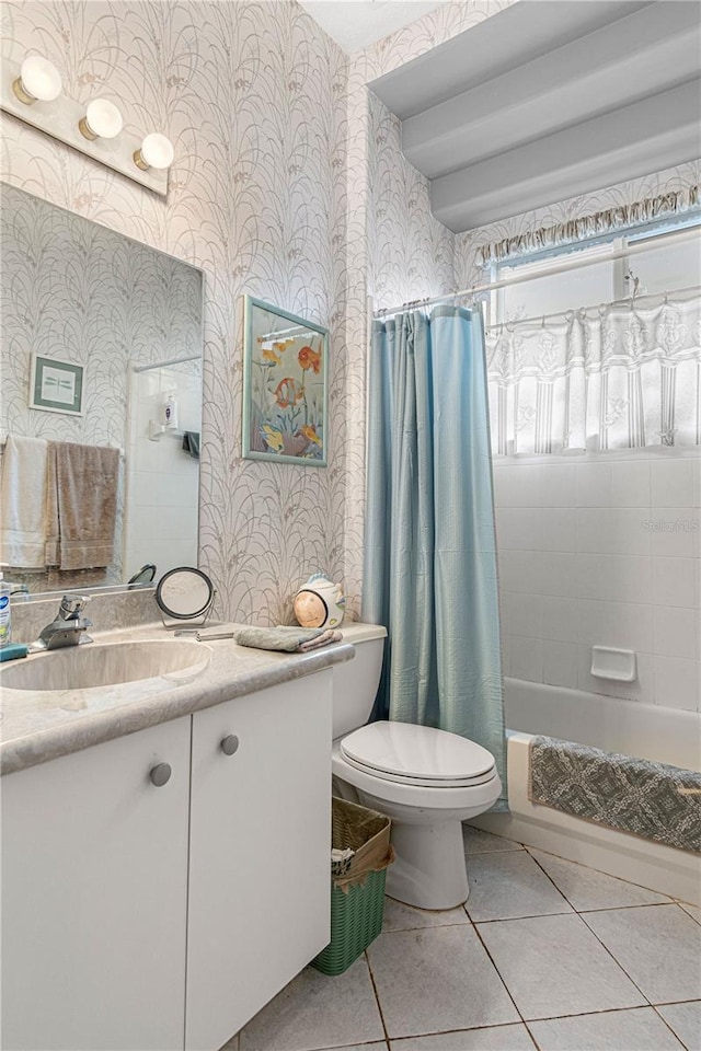 full bathroom featuring tile patterned flooring, vanity, shower / bathtub combination with curtain, and toilet