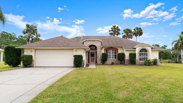 ranch-style home featuring a garage and a front lawn