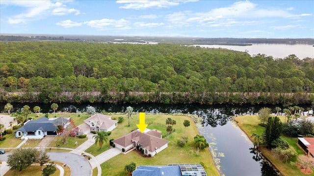 birds eye view of property featuring a water view