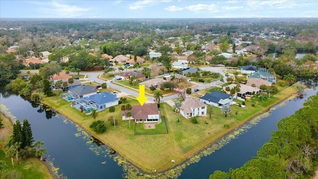 drone / aerial view with a water view