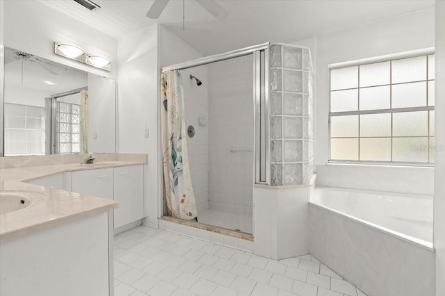 bathroom with vanity, separate shower and tub, and ceiling fan