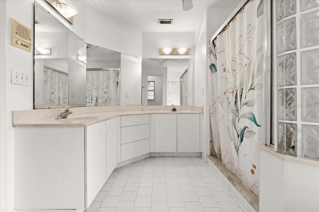 bathroom featuring vanity and walk in shower