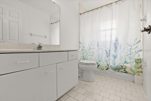 full bathroom featuring vanity, toilet, tile patterned flooring, and shower / tub combo