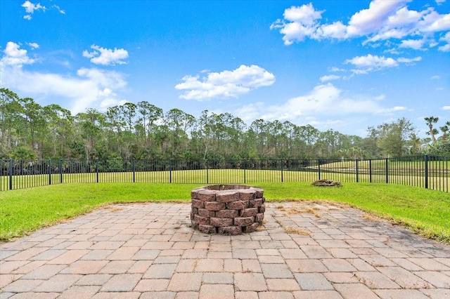 view of patio featuring an outdoor fire pit